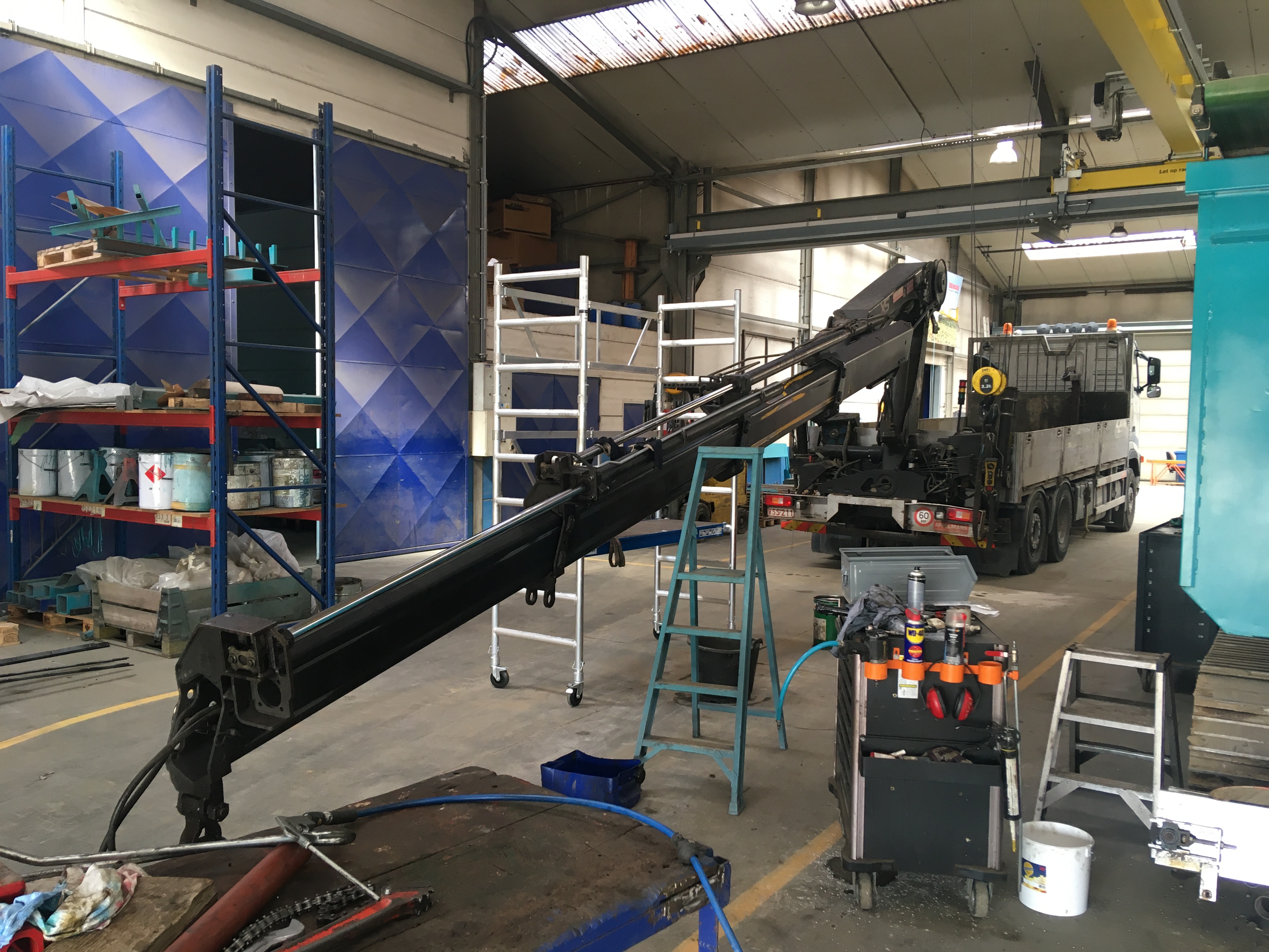 trailer crane under maintenance in workshop