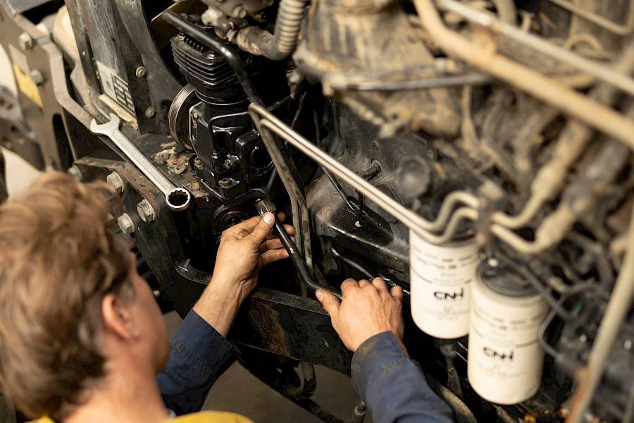 mechanic at work on engine