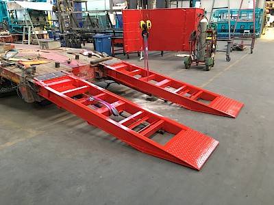Custom red ramps for a trailer