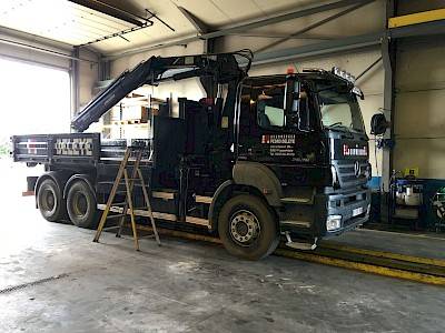photo repair depot - truck with loading bucket and crane